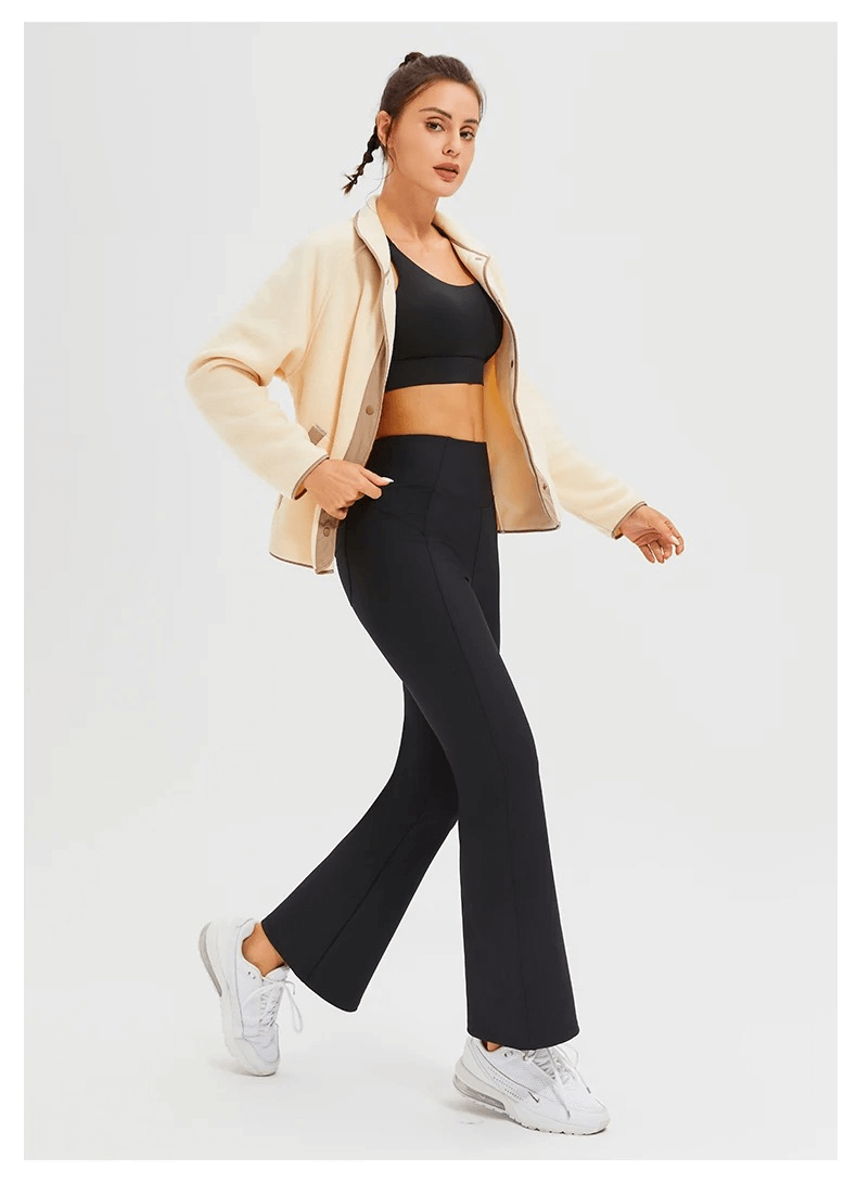 Woman wearing a stylish wool sports jacket for running, SF2009, paired with black athletic wear, showcasing winter windproof features.